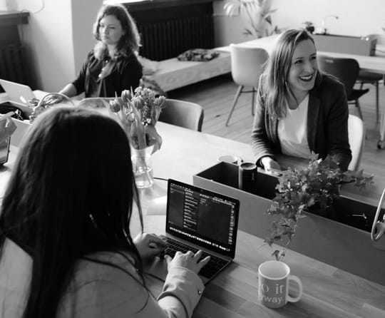 workers  chatting in office